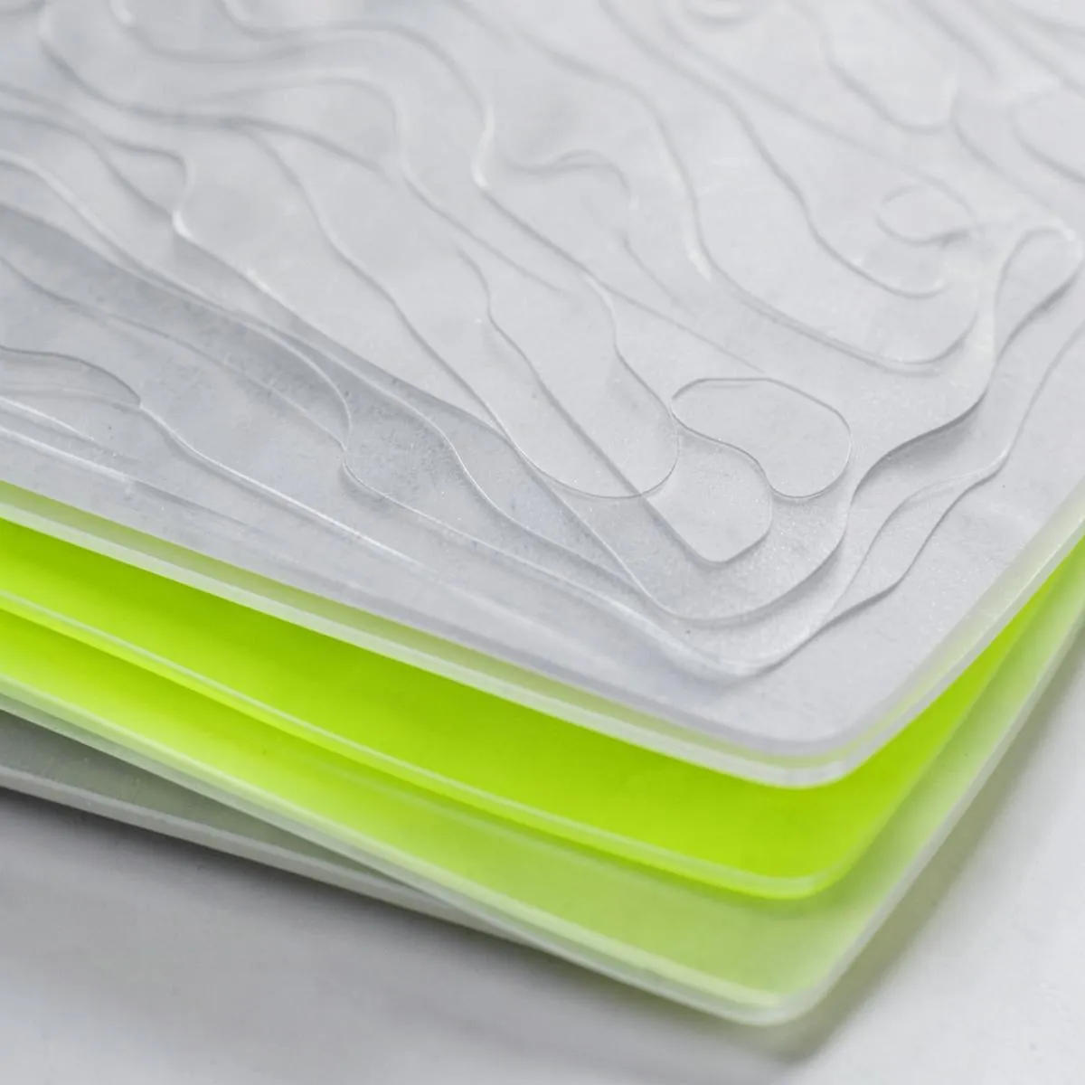 Stacked translucent layers with one lime sheet