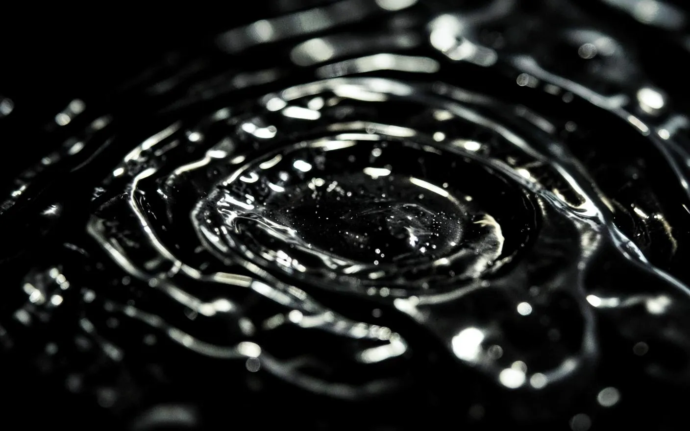 Liquid surface catching light, a metaphor for market liquidity